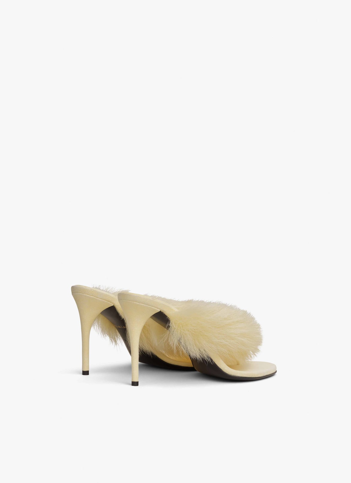 HEEL THONG MULES IN LAMBSKIN ALAÏA LIGHT YELLOW HEEL THONG MULES IN LAMBSKIN